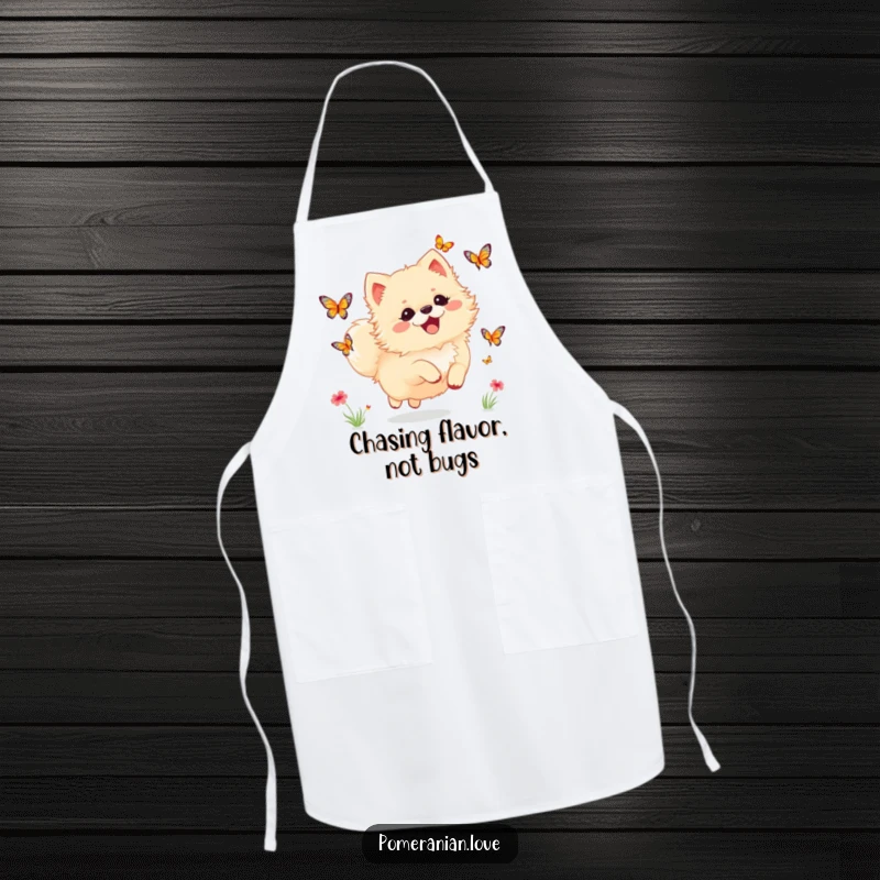 Funny Pomeranian apron of a dog joyfully chasing butterflies, perfect for chefs who love to cook with fun.