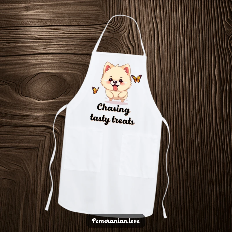 Funny Pomeranian apron, a silly dog with tongue out, chasing a butterfly, adding a humorous and fun touch to kitchen tasks.