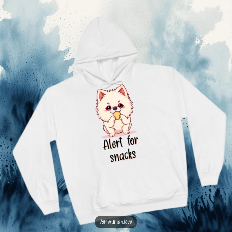 Funny Pomeranian hoodie featuring an alert dog poised to receive a treat. Embodies eagerness and a love for snacks.