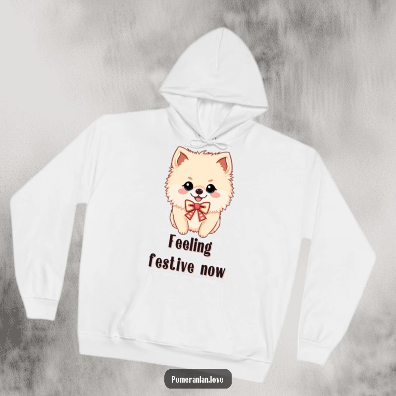Funny hoodie with a cheerful Pomeranian wearing a festive bow, cozy and humorous, a gift.