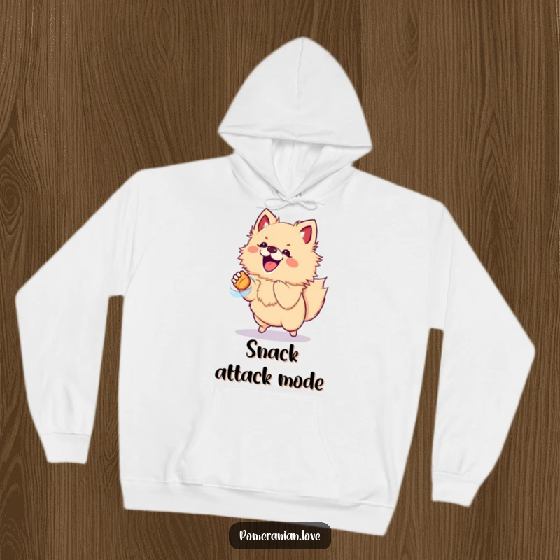 Funny hoodie with an excited Pomeranian dog jumping for a treat, perfect for cozy, energetic vibes.
