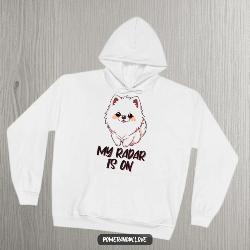 Funny Pomeranian dog with tail curled alertly over its back, depicted on a cozy hoodie, radiating vigilance.