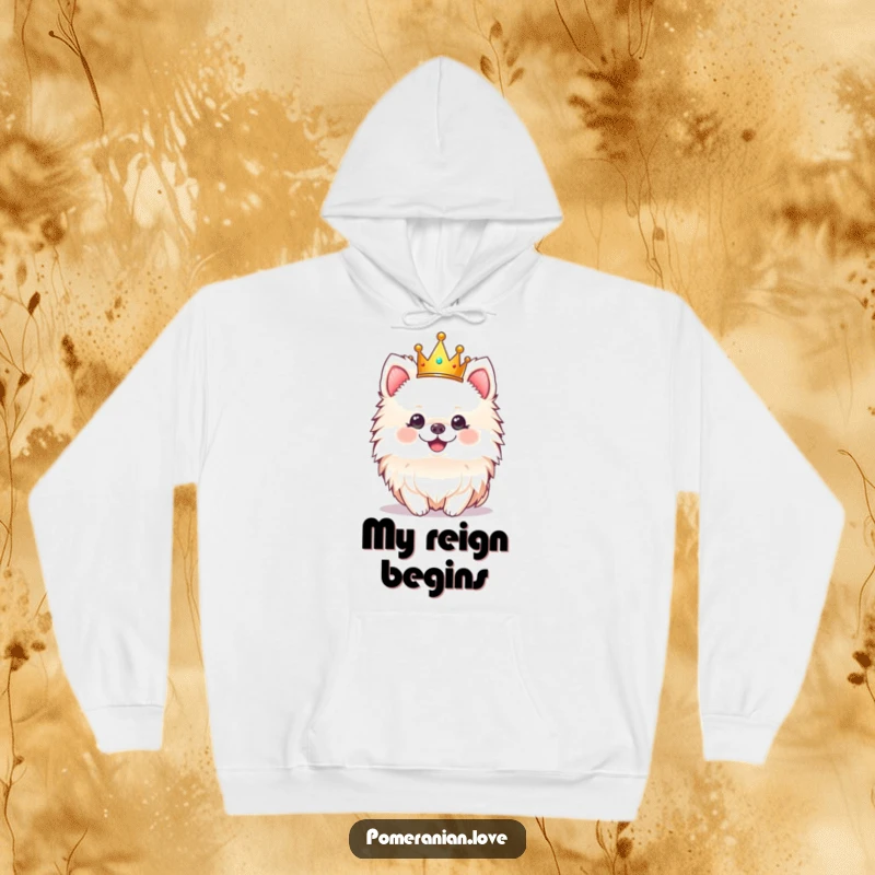Funny hoodie with a cheerful Pomeranian dog wearing a tiny crown, offering cozy, regal humor.