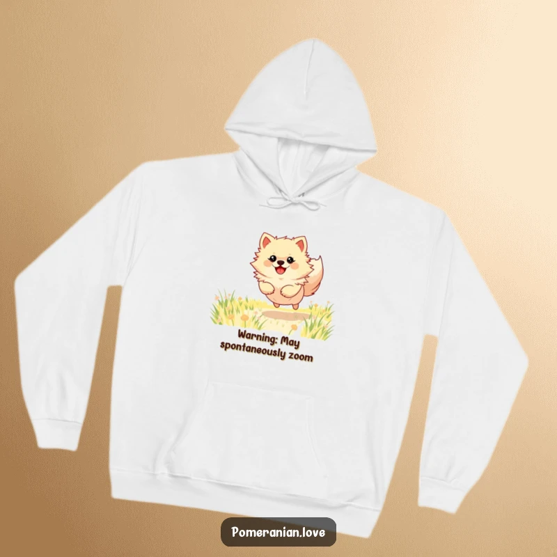 Funny Pomeranian hoodie showing a dog full of energy bounding through a field, radiating happiness and warmth for the wearer.