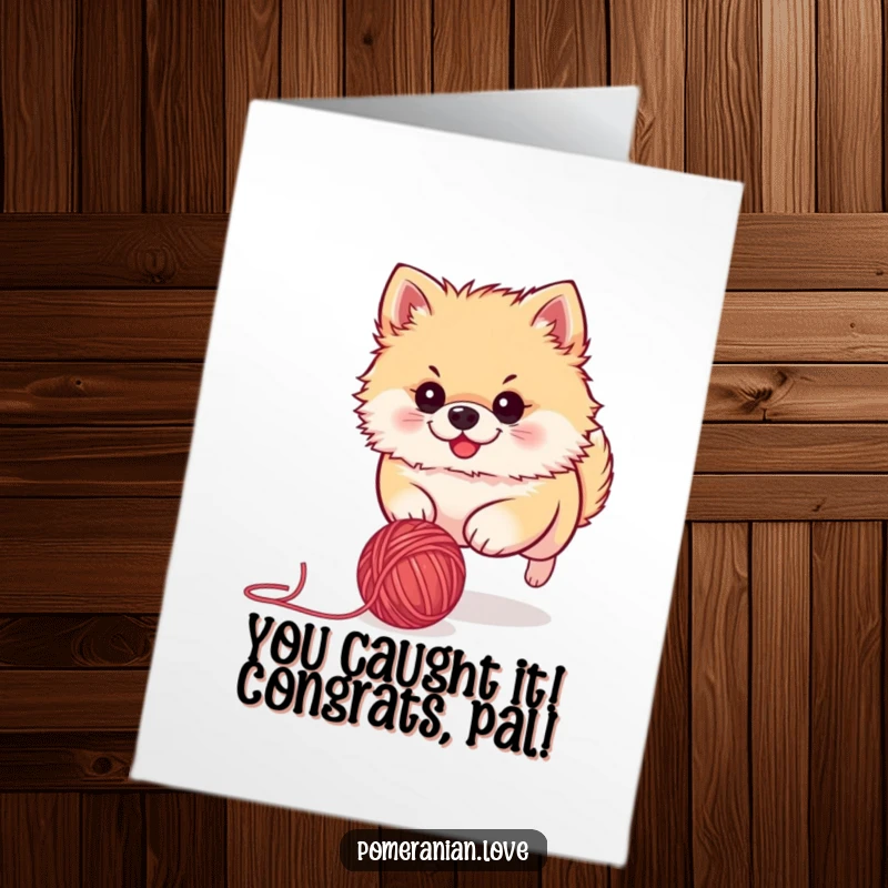 Funny Free Printable Pomeranian Congratulations Card: Cute dog intensely pursuing a yarn ball, signifying a triumphant chase.