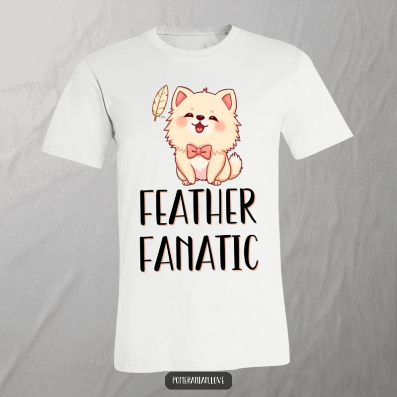 Funny Bowed Pomeranian T-Shirt: A fluffy Pomeranian in a bow happily barks at a floating feather, radiating playful energy.
