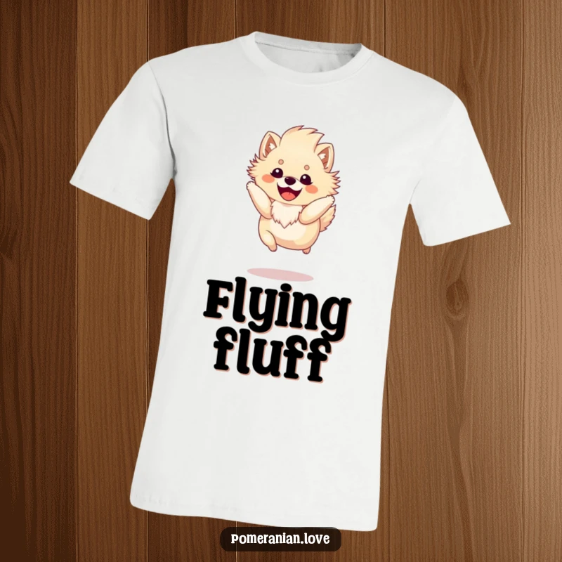 Funny Pomeranian t-shirt with a happy, fluffy-maned dog captured mid-spirited jump, showcasing boundless energy and cheerful delight.
