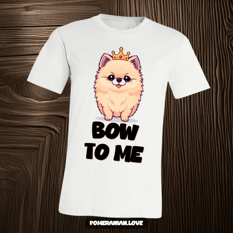 Funny t-shirt featuring a fluffy Pomeranian in a proud stance, wearing a tiny crown, looking absolutely majestic.