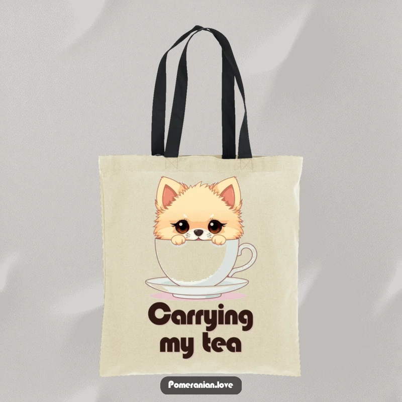 Funny tote bag featuring a Pomeranian with wide, curious eyes peeking from a teacup, perfect for carrying items with a touch of whimsy.