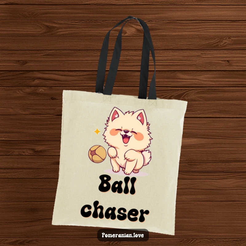 Funny Pomeranian dog character energetically barking at a bouncing ball, showcasing its playful spirit on this stylish tote bag.